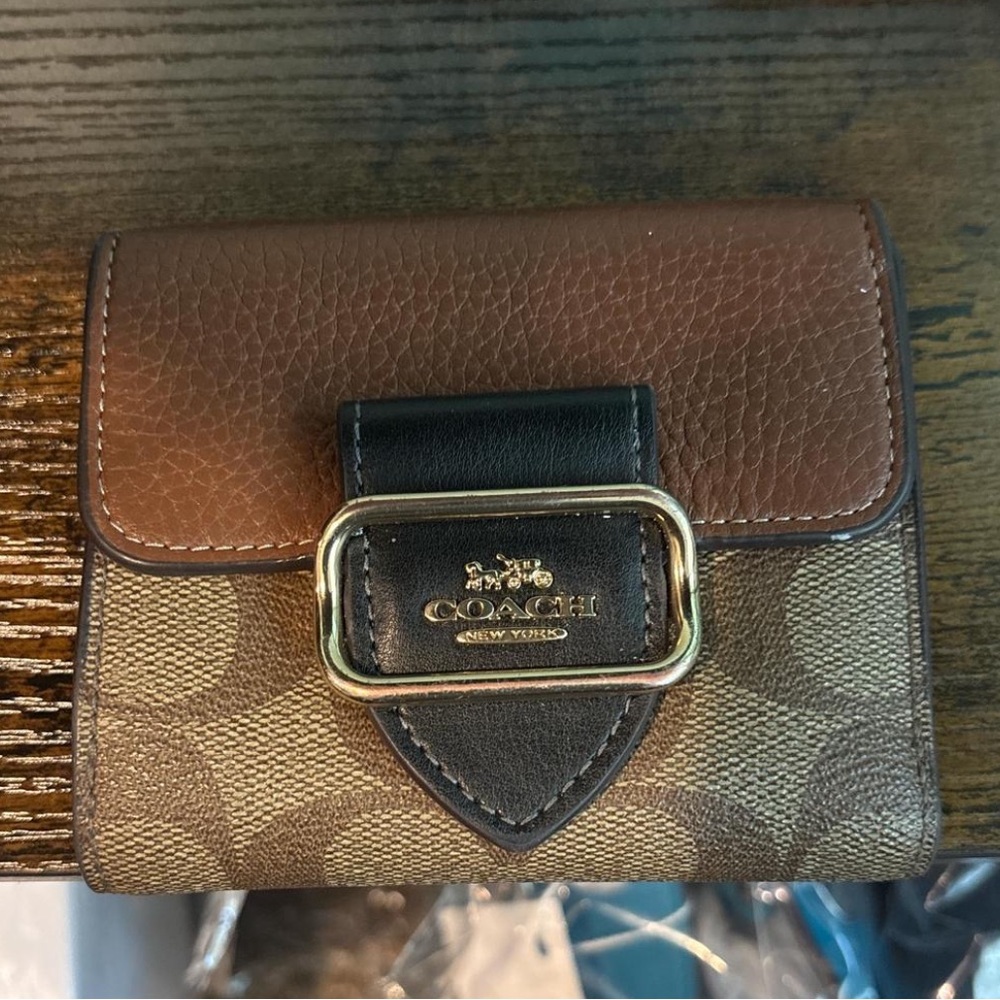 Coach Signature Canvas Brown/Tan and Black Bifold Wallet with Gold Buckle